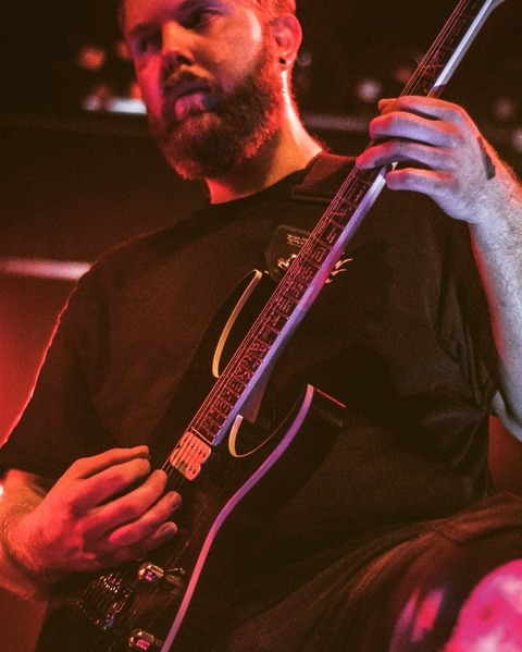 Header of bearded_guitarist